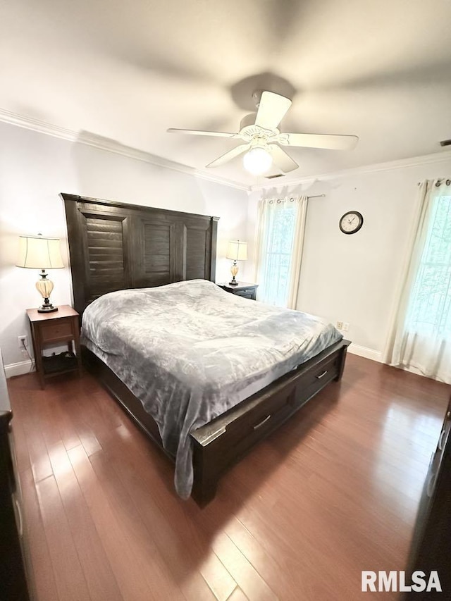 2939 Delora Ln, Herrin, IL 62948 - bedroom with dark wood finished floors, crown molding, a ceiling fan, and baseboards