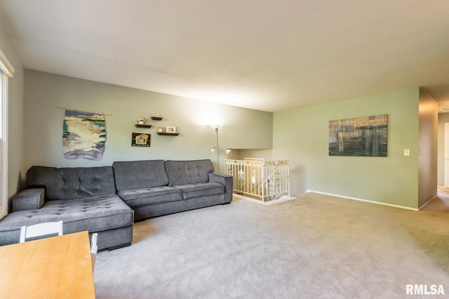 2885 Willow Dr, Bettendorf, IA 52722 - living area featuring carpet and baseboards