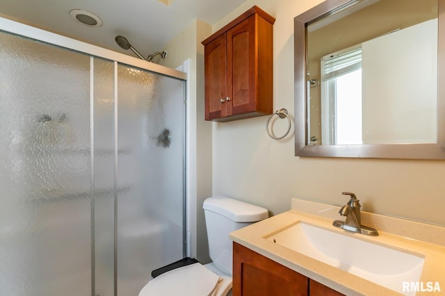 2885 Willow Dr, Bettendorf, IA 52722 - full bath featuring a shower stall, vanity, and toilet