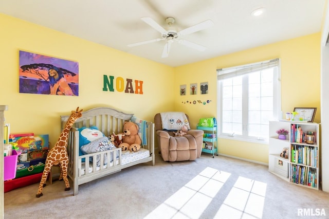 2885 Willow Dr, Bettendorf, IA 52722 - carpeted bedroom with a ceiling fan