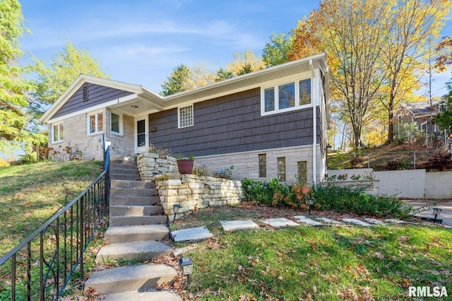 1 Kenwood Ave, Davenport, IA 52803 - view of front of house with stone siding and stairway