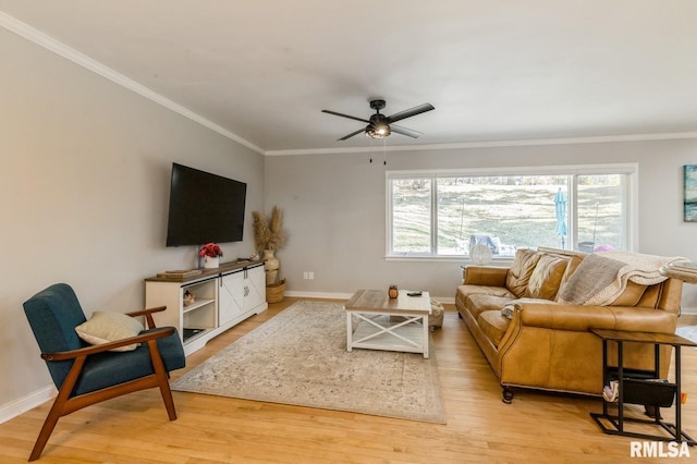 1 Kenwood Ave, Davenport, IA 52803 - living room with light wood-style floors, ceiling fan, ornamental molding, and baseboards