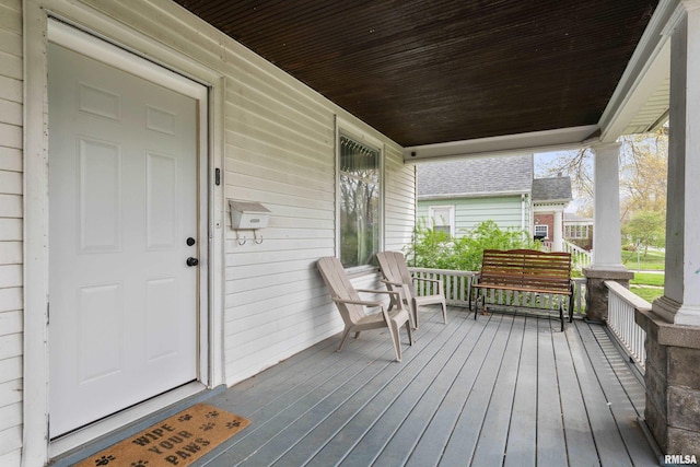 2307 N Ripley St, Davenport, IA 52803 - deck featuring covered porch