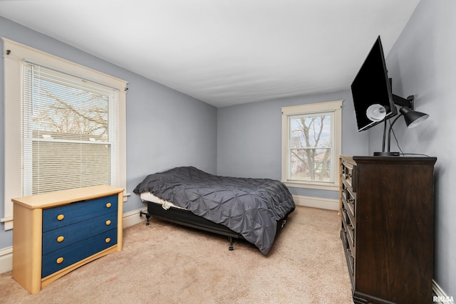 2307 N Ripley St, Davenport, IA 52803 - bedroom featuring light colored carpet and baseboards