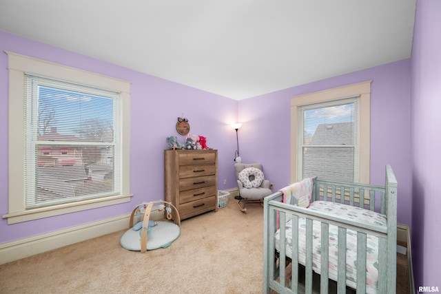 2307 N Ripley St, Davenport, IA 52803 - carpeted bedroom featuring baseboards