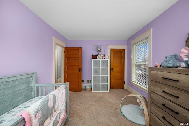 2307 N Ripley St, Davenport, IA 52803 - bedroom with carpet and baseboards