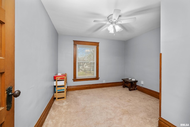 2307 N Ripley St, Davenport, IA 52803 - unfurnished room with baseboards, carpet, and ceiling fan