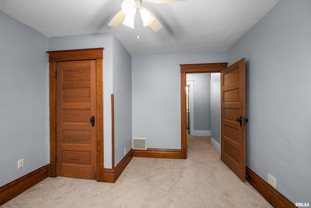 2307 N Ripley St, Davenport, IA 52803 - bedroom featuring baseboards, carpet flooring, and ceiling fan