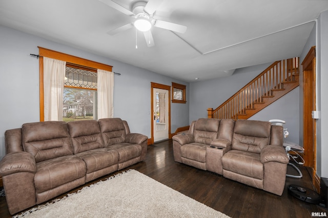 2307 N Ripley St, Davenport, IA 52803 - living area featuring wood finished floors, a ceiling fan, baseboards, and stairway