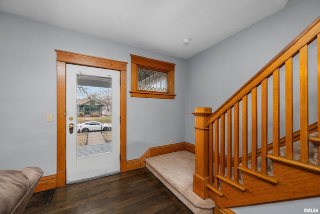 2307 N Ripley St, Davenport, IA 52803 - doorway featuring dark wood-style flooring, stairway, and baseboards