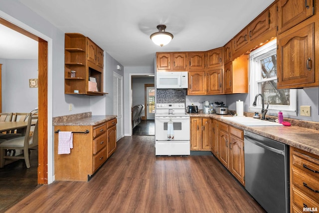 2307 N Ripley St, Davenport, IA 52803 - kitchen with white appliances, a sink, open shelves, dark wood-type flooring, and brown cabinetry
