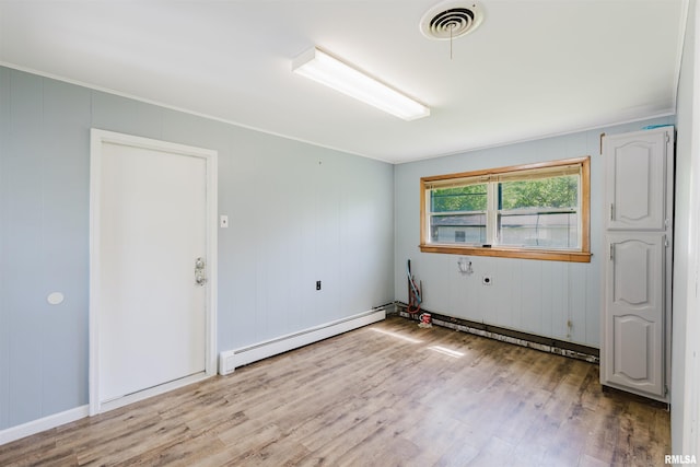 602 Barr St, Carterville, IL 62918 - spare room with a baseboard radiator, wood finished floors, and crown molding