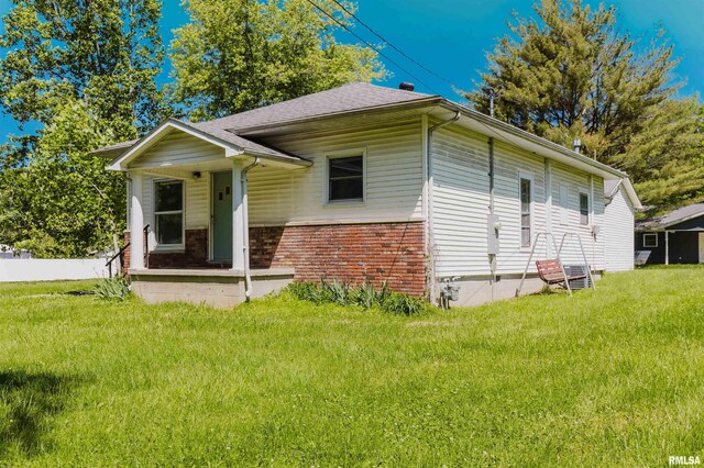 602 Barr St, Carterville, IL 62918 - view of front of home with brick siding and roof with shingles