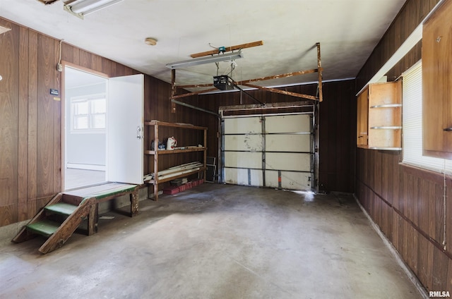 602 Barr St, Carterville, IL 62918 - garage featuring wooden walls and a garage door opener