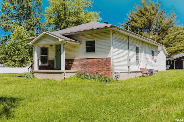 602 Barr St, Carterville, IL 62918 - view of front of house with brick siding and a shingled roof