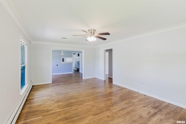 602 Barr St, Carterville, IL 62918 - unfurnished room with a baseboard heating unit, a ceiling fan, crown molding, light wood-style flooring, and baseboards