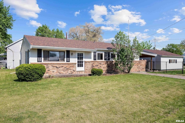 ranch-style house with brick siding and asphalt driveway
