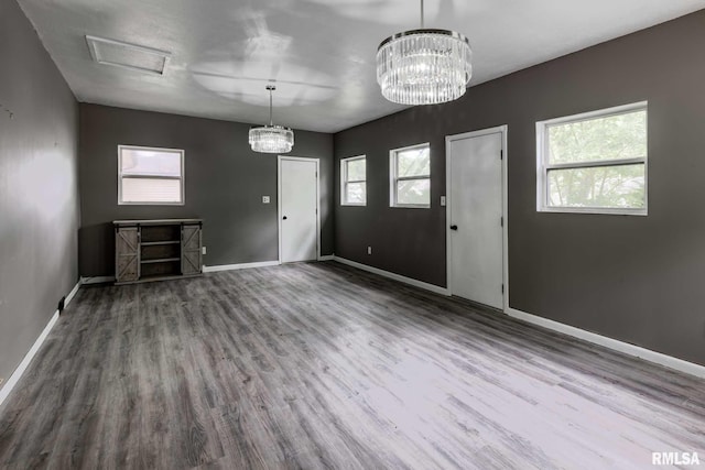 1401 Thomas St, Carterville, IL 62918 - foyer featuring wood finished floors, baseboards, and a chandelier