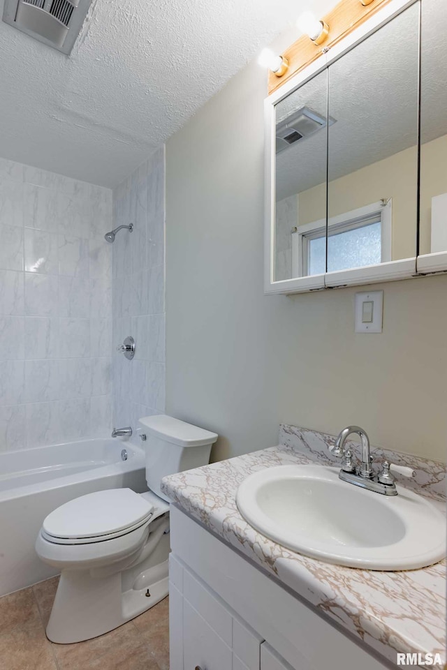 1401 Thomas St, Carterville, IL 62918 - bathroom with toilet, a textured ceiling, vanity, shower / tub combination, and tile patterned floors
