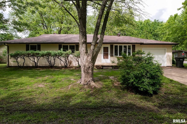 1401 Thomas St, Carterville, IL 62918 - ranch-style home with a garage, driveway, and a front lawn