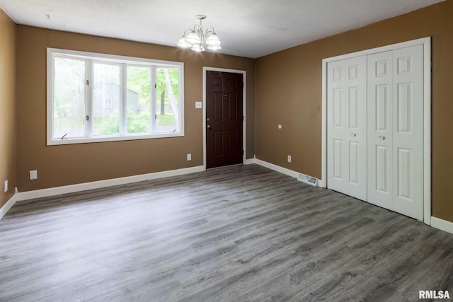 1401 Thomas St, Carterville, IL 62918 - entryway featuring a chandelier, wood finished floors, and baseboards