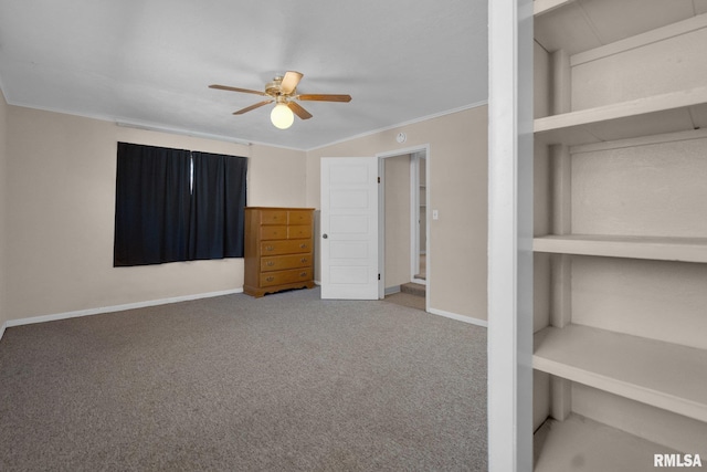 2910 Central Ave, Bettendorf, IA 52722 - unfurnished bedroom with carpet, crown molding, baseboards, and a ceiling fan