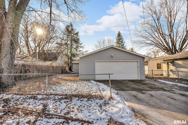 2910 Central Ave, Bettendorf, IA 52722 - snow covered garage with a garage and fence