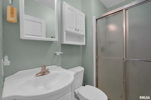 2910 Central Ave, Bettendorf, IA 52722 - full bathroom featuring a shower stall, toilet, and vanity
