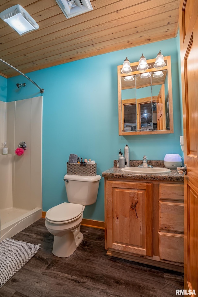 1012 Viaduct Rd, Savanna, IL 61074 - bathroom with a shower, vanity, toilet, baseboards, and wood ceiling