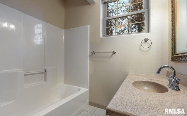 2505 Joel Dr, Herrin, IL 62948 - bathroom featuring a sink, tile patterned floors, and shower / washtub combination