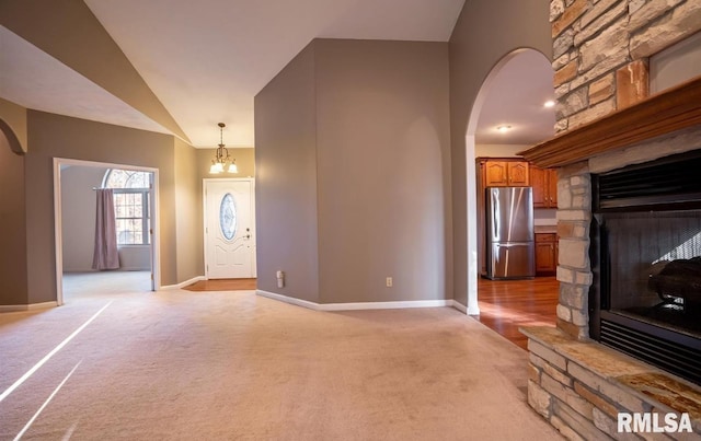2505 Joel Dr, Herrin, IL 62948 - entryway featuring arched walkways, light carpet, and baseboards
