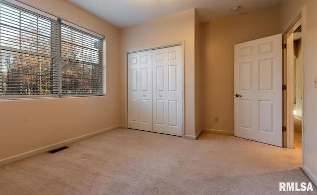 2505 Joel Dr, Herrin, IL 62948 - unfurnished bedroom with carpet floors, a closet, and baseboards