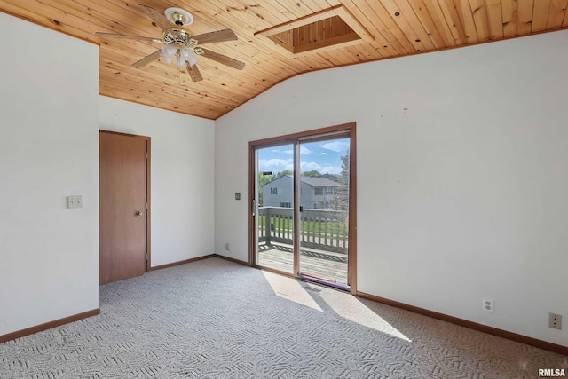 spare room with wooden ceiling, vaulted ceiling, a ceiling fan, light carpet, and a skylight