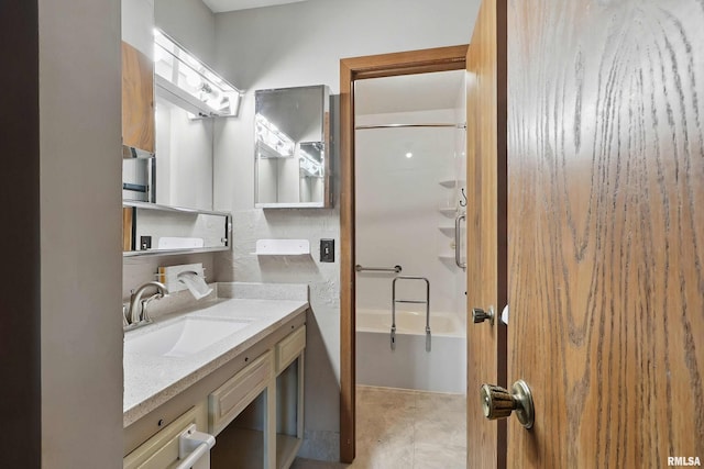 bathroom with vanity and shower / bath combination