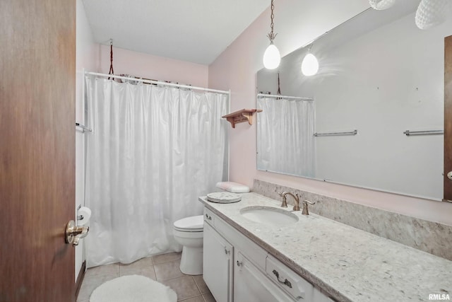 3816 Woodland Ct, Davenport, IA 52807 - bathroom featuring tile patterned floors, vanity, toilet, and a shower with curtain