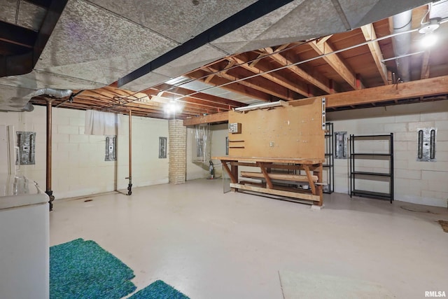 3816 Woodland Ct, Davenport, IA 52807 - unfinished basement with a workshop area and concrete block wall