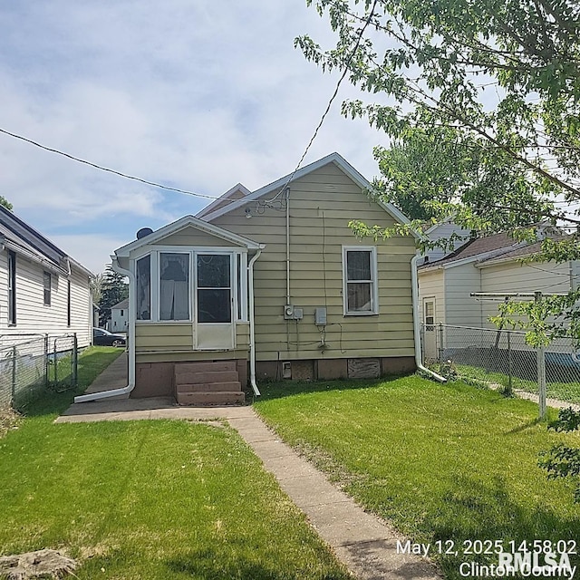 back of house featuring crawl space and entry steps