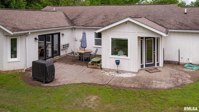 6443 Roberts Rd, Marion, IL 62959 - back of property with a patio area, roof with shingles, and a yard