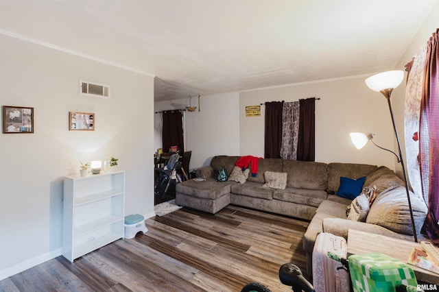 living area featuring wood finished floors and baseboards