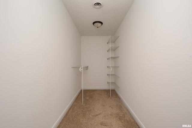 9932 123rd St, Davenport, IA 52804 - walk in closet with light colored carpet