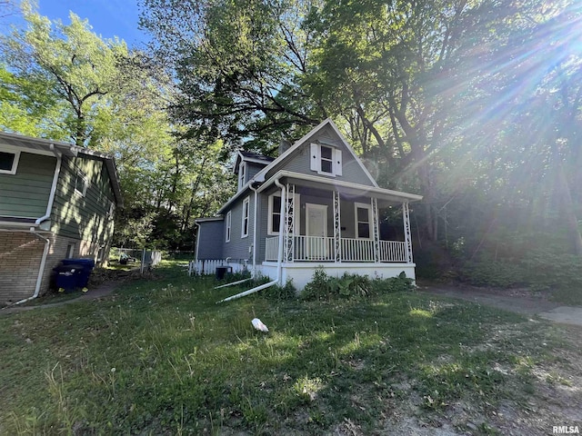1935 12th Ave, Moline, IL 61265 - bungalow featuring a porch