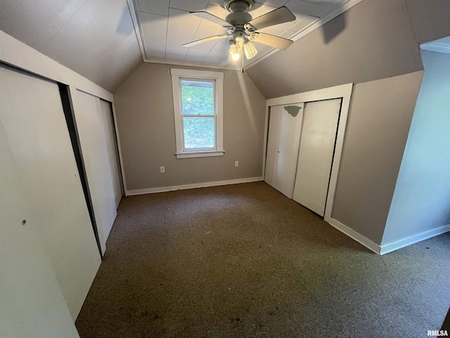 1935 12th Ave, Moline, IL 61265 - unfurnished bedroom featuring carpet floors, lofted ceiling, baseboards, and a ceiling fan