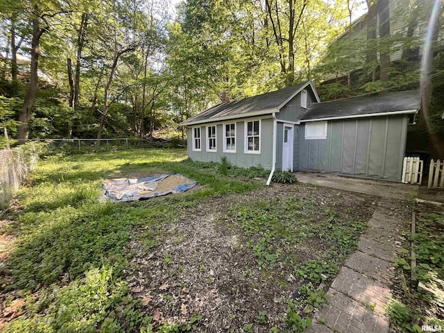 1935 12th Ave, Moline, IL 61265 - rear view of property featuring fence