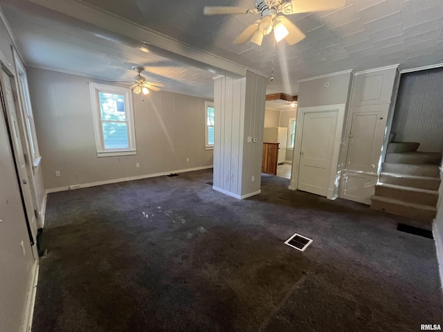 1935 12th Ave, Moline, IL 61265 - unfurnished bedroom featuring dark colored carpet, baseboards, a ceiling fan, freestanding refrigerator, and ornamental molding