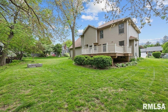 3217 Arlington Cir, Davenport, IA 52803 - back of property featuring a deck and a lawn