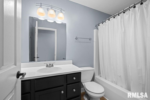 3217 Arlington Cir, Davenport, IA 52803 - bathroom featuring toilet, vanity, and shower / tub combo