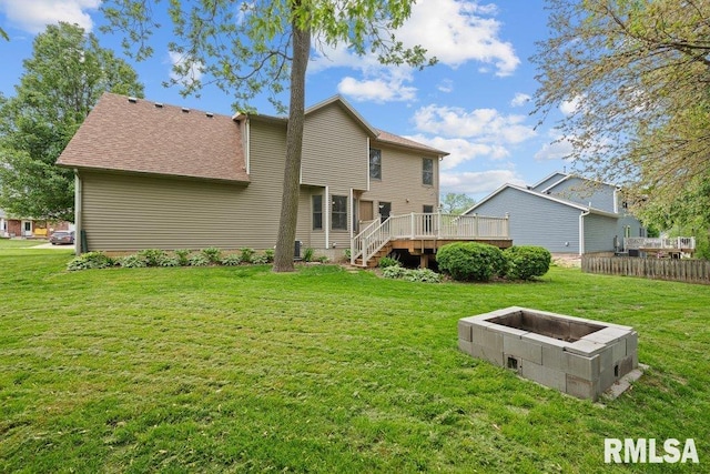 3217 Arlington Cir, Davenport, IA 52803 - rear view of property with a wooden deck, a shingled roof, and stairway