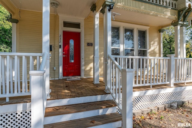 232 E 13th St, Davenport, IA 52803 - doorway to property featuring covered porch