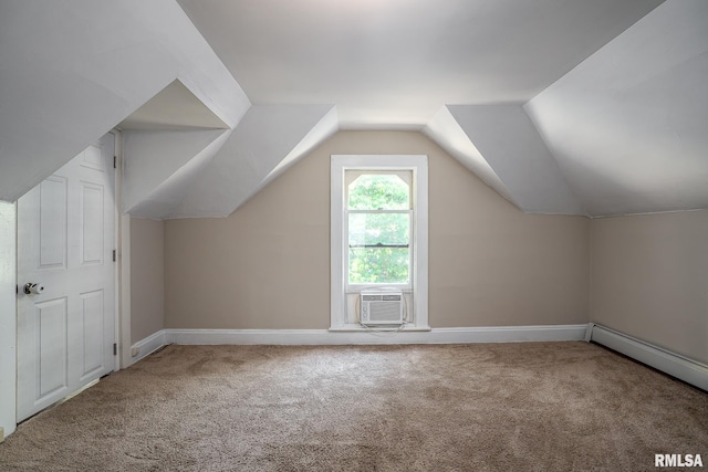 232 E 13th St, Davenport, IA 52803 - additional living space with carpet flooring, baseboards, cooling unit, and vaulted ceiling