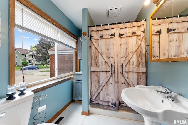 101 N Ridge St, Cambridge, IL 61238 - bathroom featuring a sink and toilet